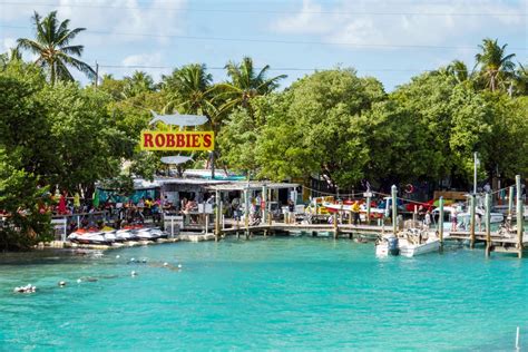 Robbie's islamorada - Robbie’s Islamorada. Robbie’s is THE place to take your kids. It is a keys tradition. They are famous for their docks where visitors can feed the giant Tarpons. There is a school of more than 100 tarpon that …